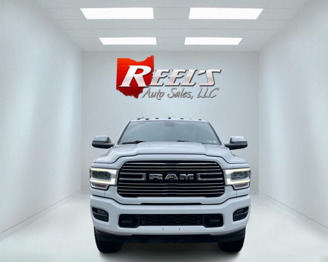 2020 White /Black RAM 2500 Laramie Crew Cab SWB 4WD (3C6UR5FL7LG) with an 6.7L I6 OHV 24V TURBO DIESEL engine, 6A transmission, located at 11115 Chardon Rd. , Chardon, OH, 44024, (440) 214-9705, 41.580246, -81.241943 - This 2020 Ram 2500 Laramie Crew Cab is a powerhouse pickup truck designed for serious towing and hauling capabilities. Under the hood lies a 6.7L Cummins Turbo Diesel engine mated to a 6-speed 68RFE transmission with 3.73 gearing, producing an impressive 370 hp and a staggering 850 lb-ft of torque. - Photo#1